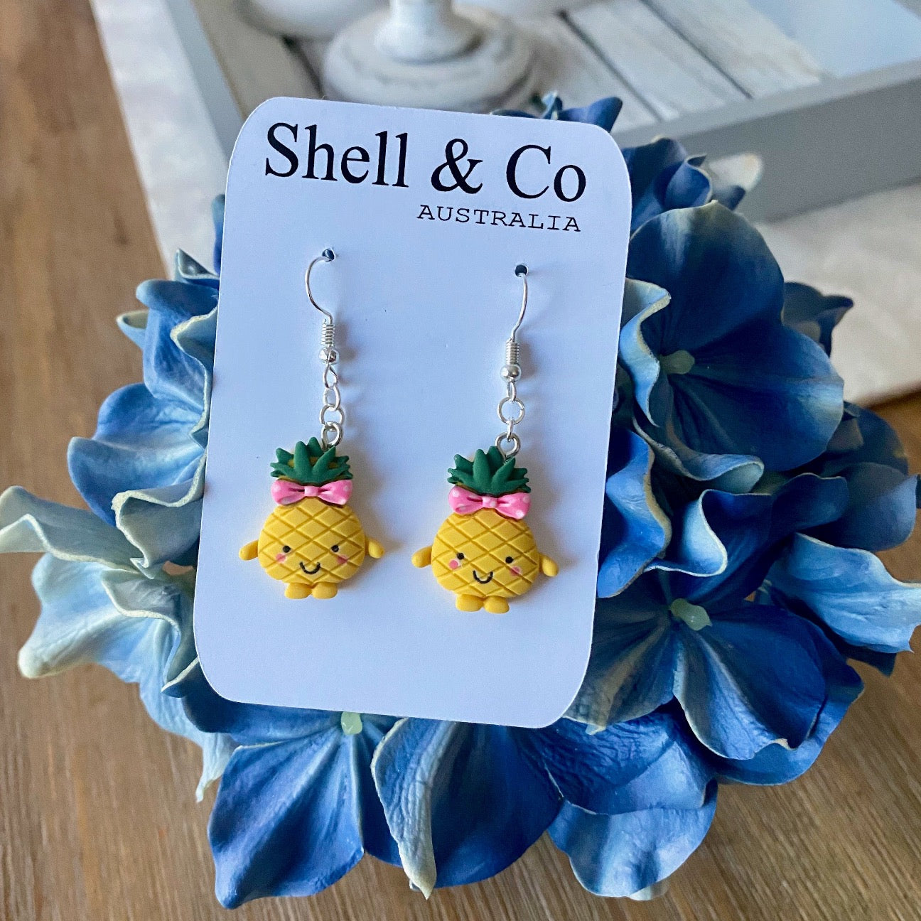 Pineapple store clay earrings