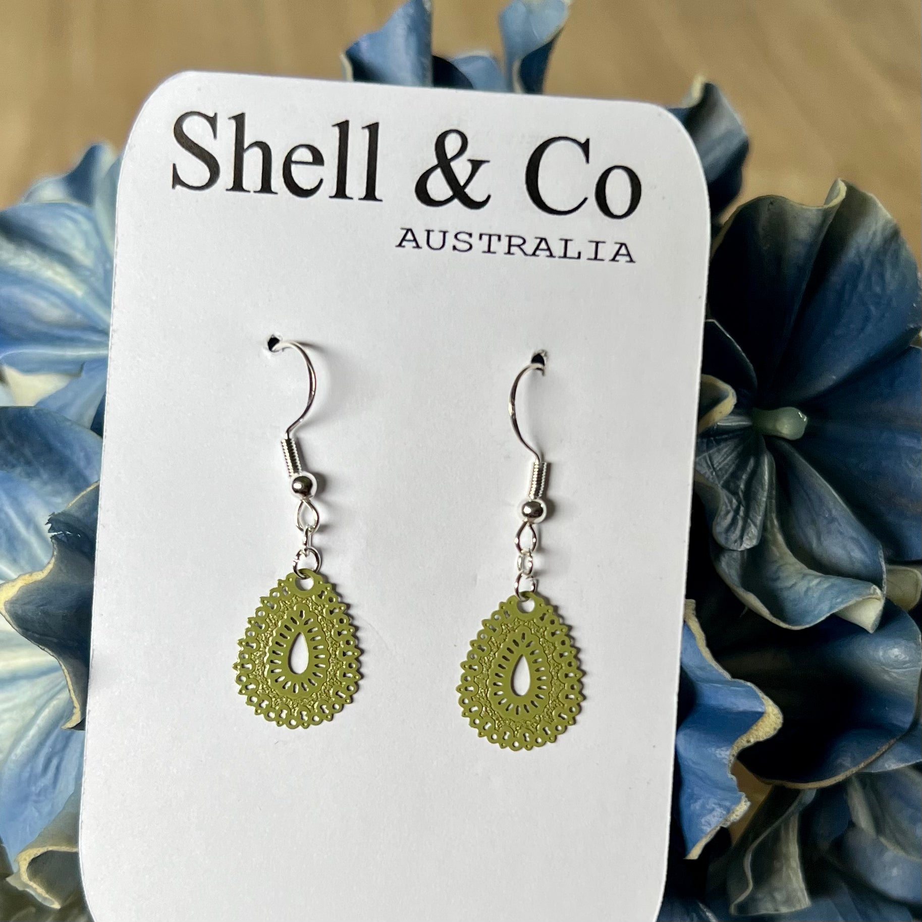 Green teardrop store earrings