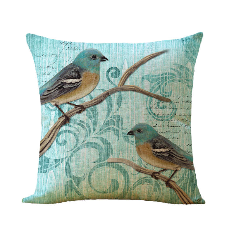 Teal Bird on a branch Cushion Cover